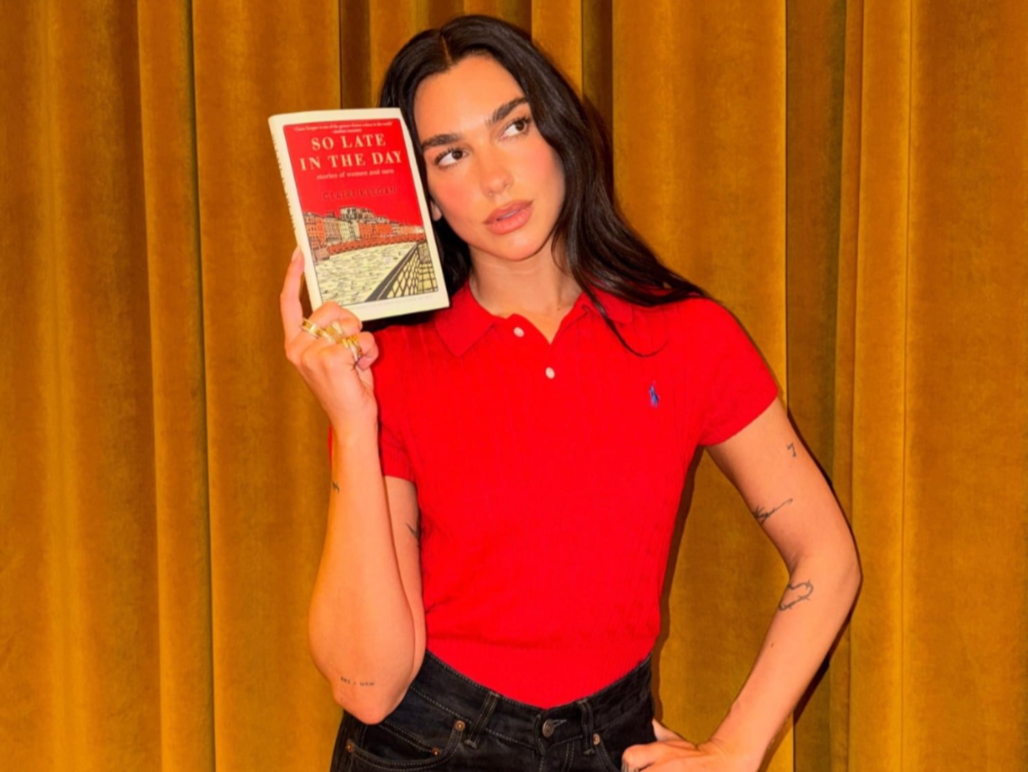 Dua Lipa drives reading through editorial aesthetics highlighting contemporary literature, fashion, identity, and community connections