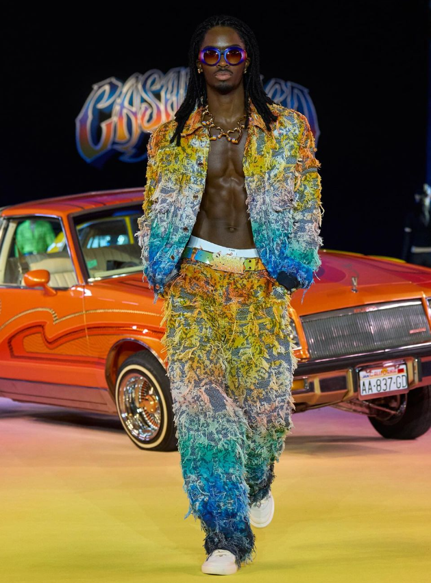 Casablanca's latest collection, inspired by Los Angeles' Mexican-American surf and skate culture, debuted at Paris Fashion Week. The vibrant show featured colorful lowriders and a mix of streetwear and luxury, reflecting the laid-back yet dynamic West Coast lifestyle.